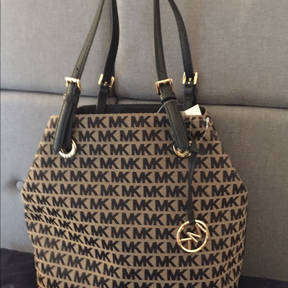 Michael Kors  New with tags Black and Tan canvas